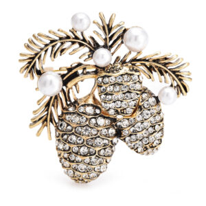 Broche dorée en forme de feuilles avec perles blanches et pierres claires
