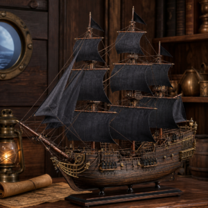 Maquette de voilier pirate en bois avec voiles sombres
